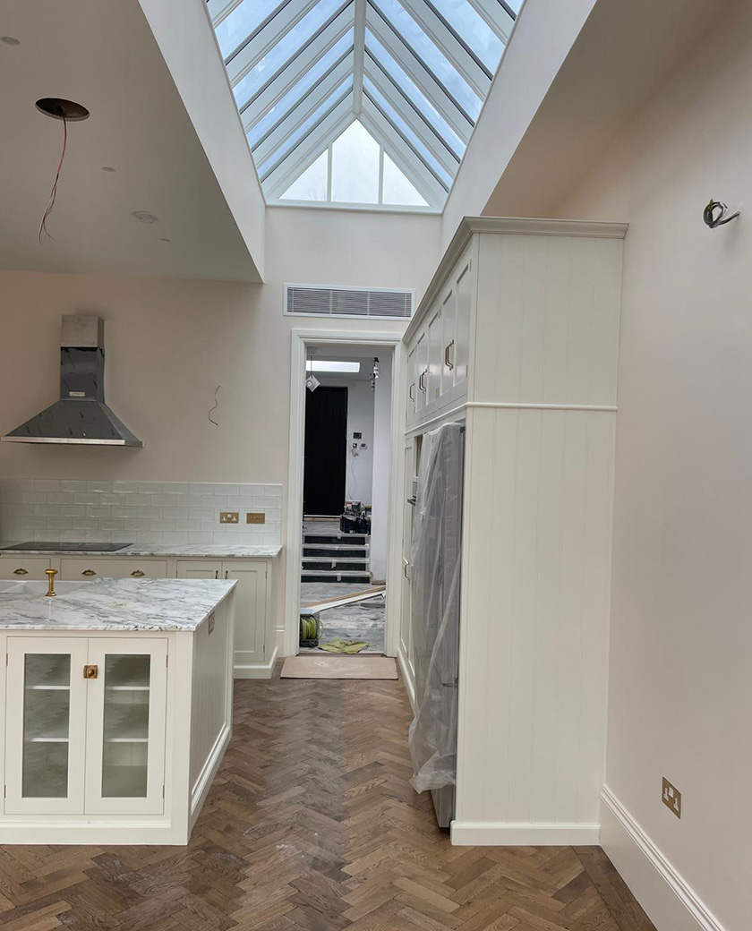 Kitchen extension with island, roof lantern and herringbone floor – kitchen extension layouts