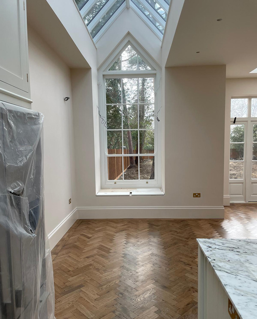 Kitchen rear extension with glazed roof lantern and herringbone floor – side-return extension guide