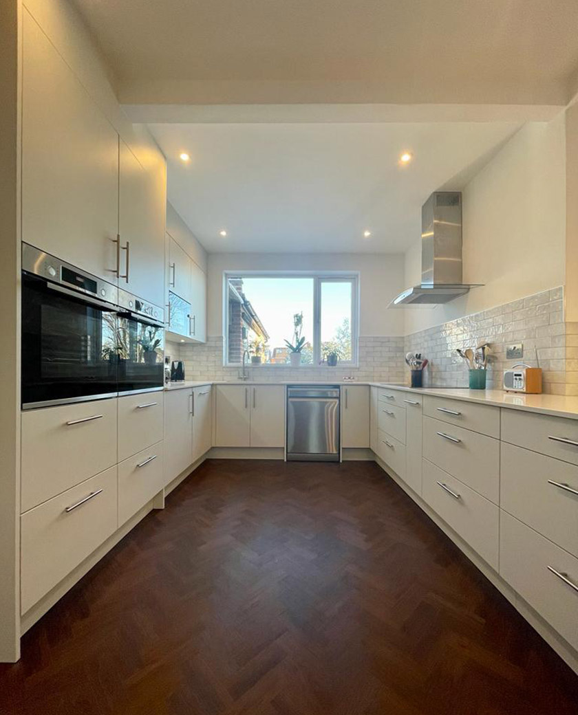 Finished rear extension kitchen in Barnet with parquet floor – house extension cost guide